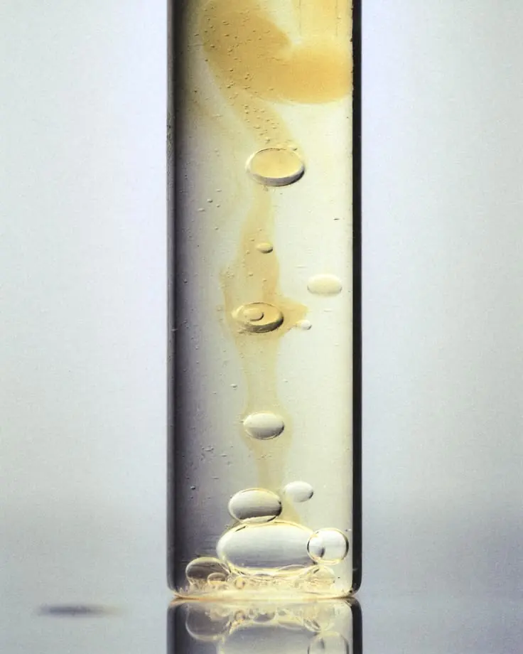 Close view of spirit sample under laboratory inspection